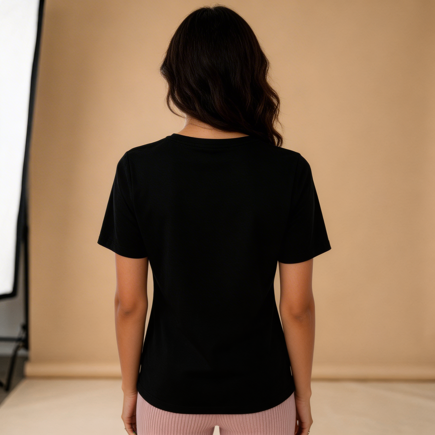 Camiseta larga negra con detalle lateral